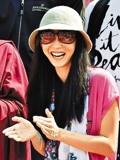 从张柏芝灿烂的笑容，很难想象她正处于婚变的困扰